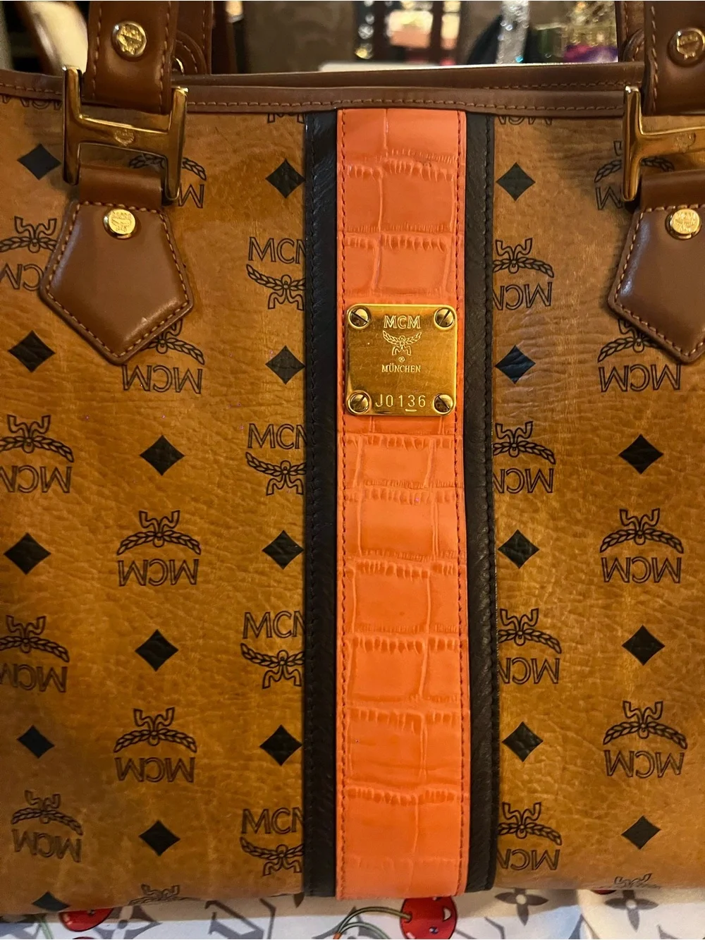 MCM gold tone
